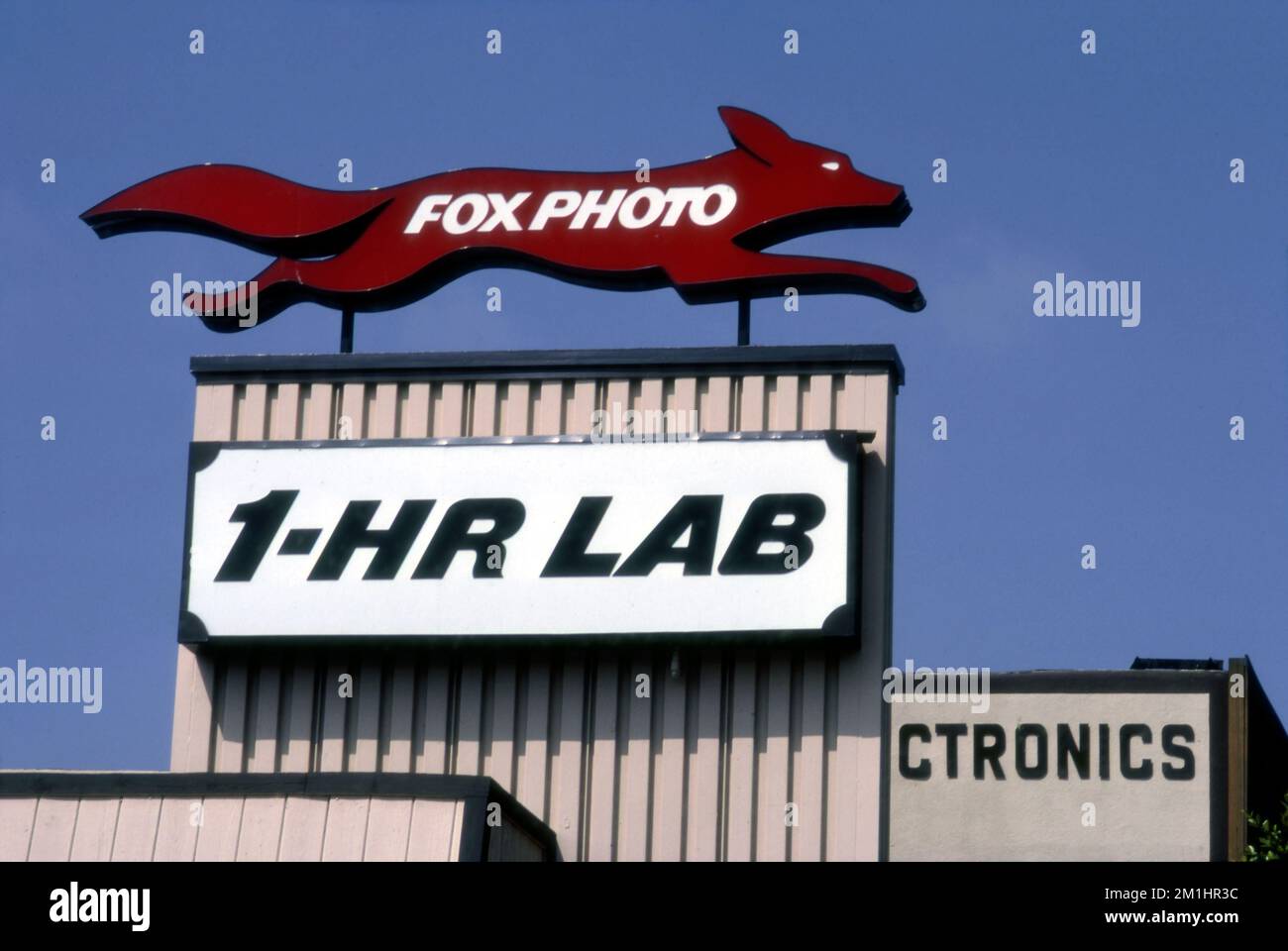 Sign for Fox Photo one hour photo developing from film on Pico Blvd. in West L.A., Los Angeles, CA 1985 Stock Photo