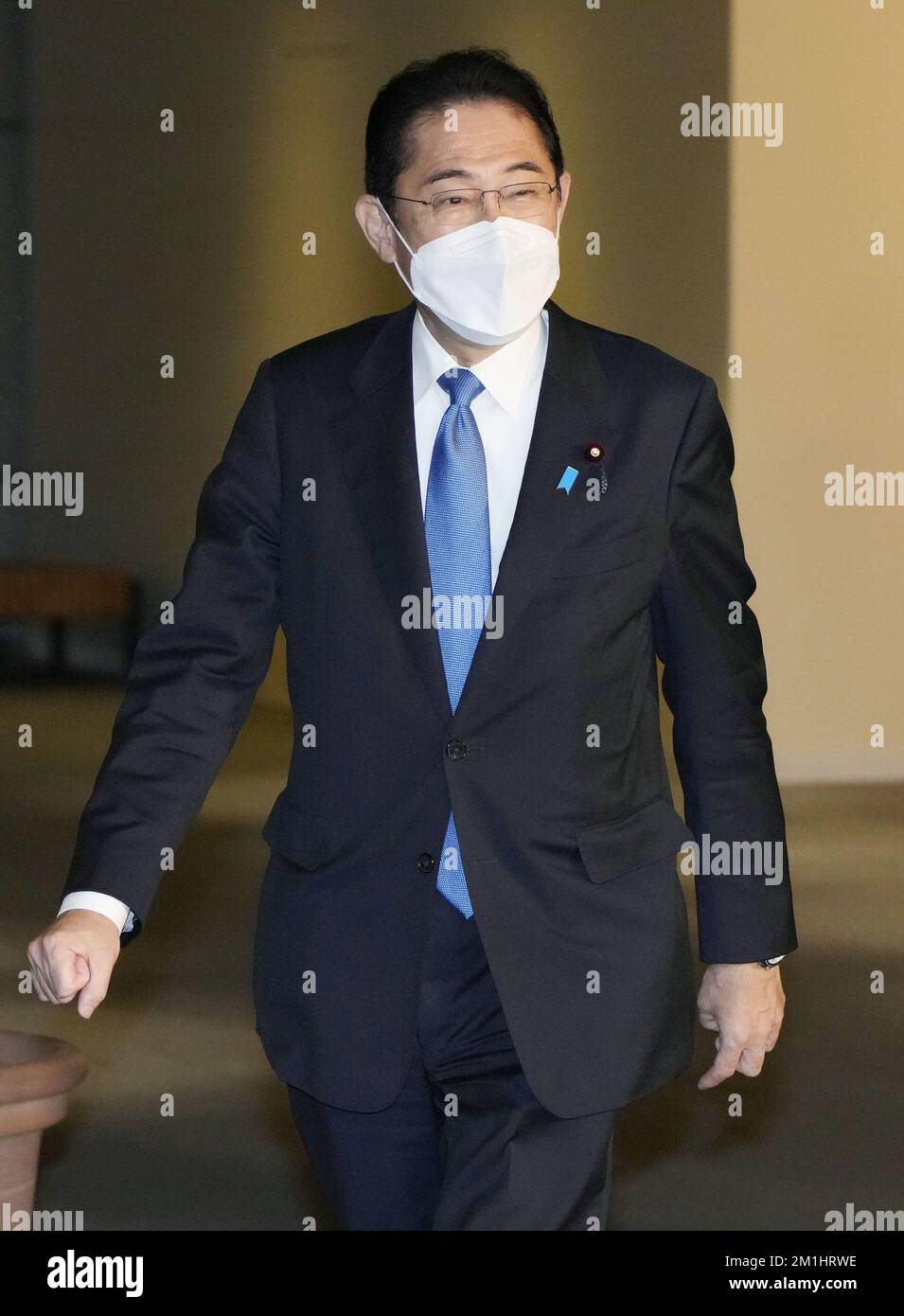 Japanese Prime Minister Fumio Kishida speaks to reporters at his