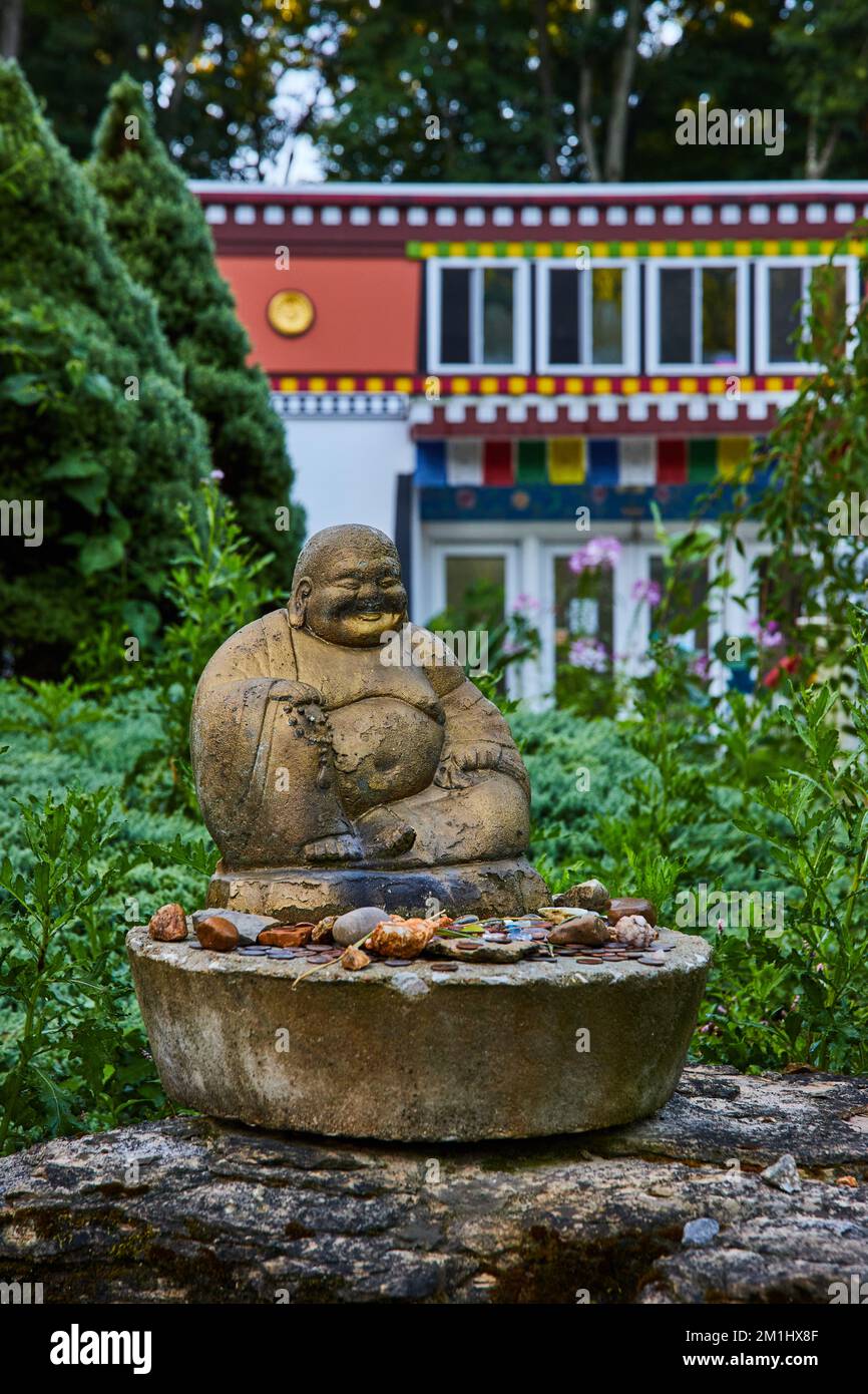 Small Buddha statue outside of shrine in Indiana Stock Photo Alamy
