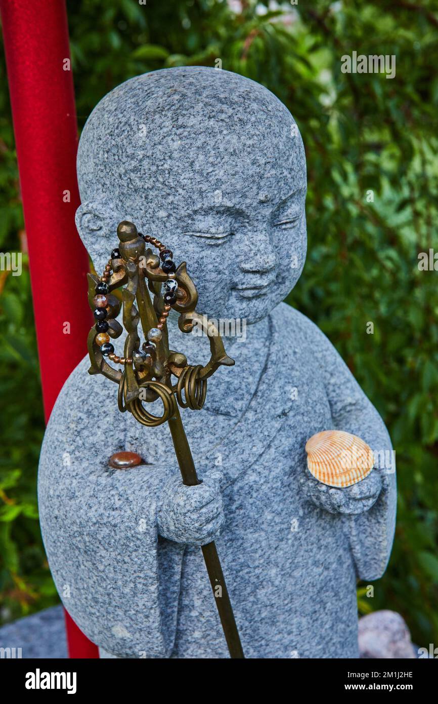 Detail of stone statue figure at Tibetan Mongolian Buddhist shrine