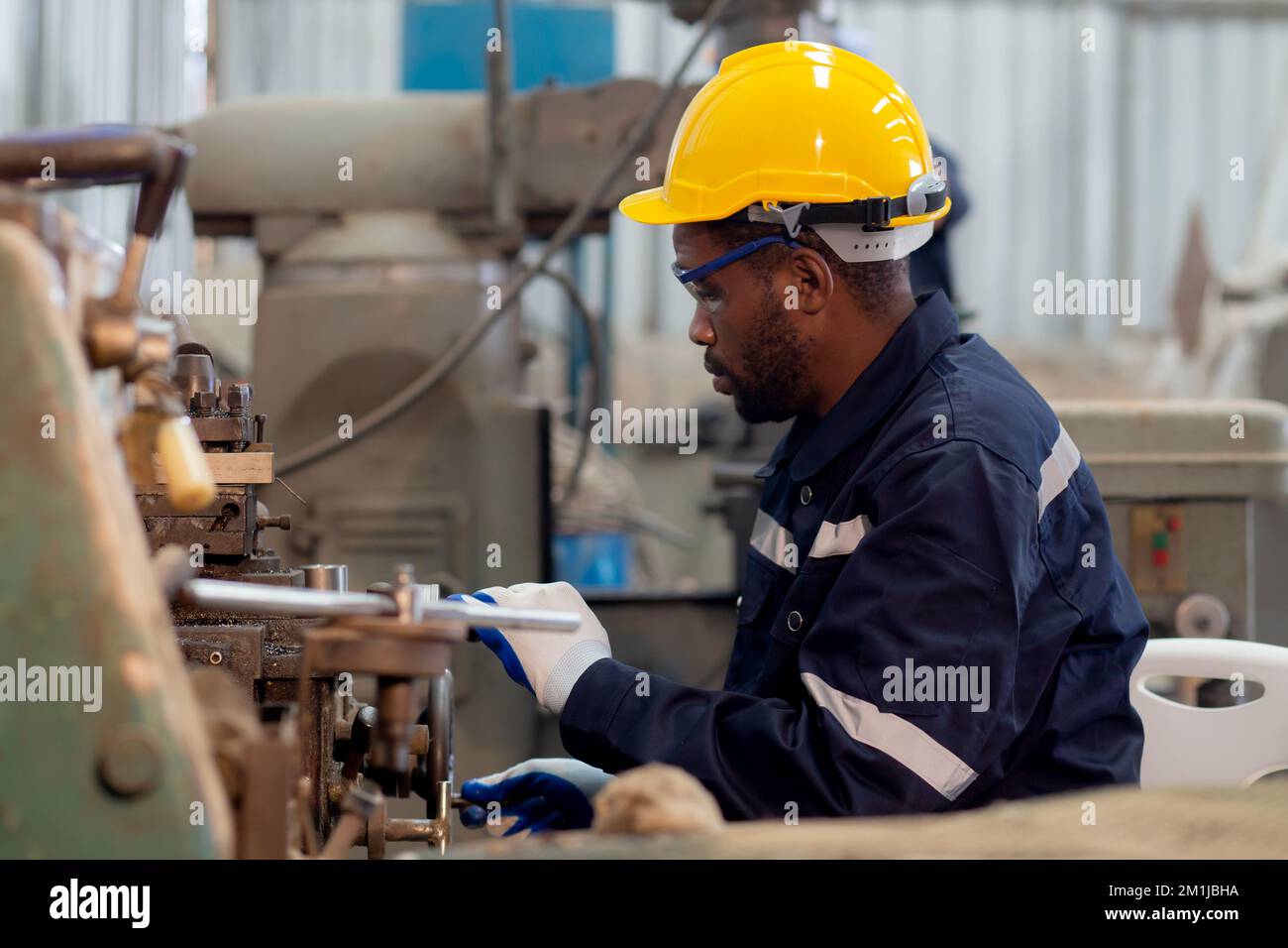 Laborer Operator Black male worker lathe operator hi-res stock photography and images ...