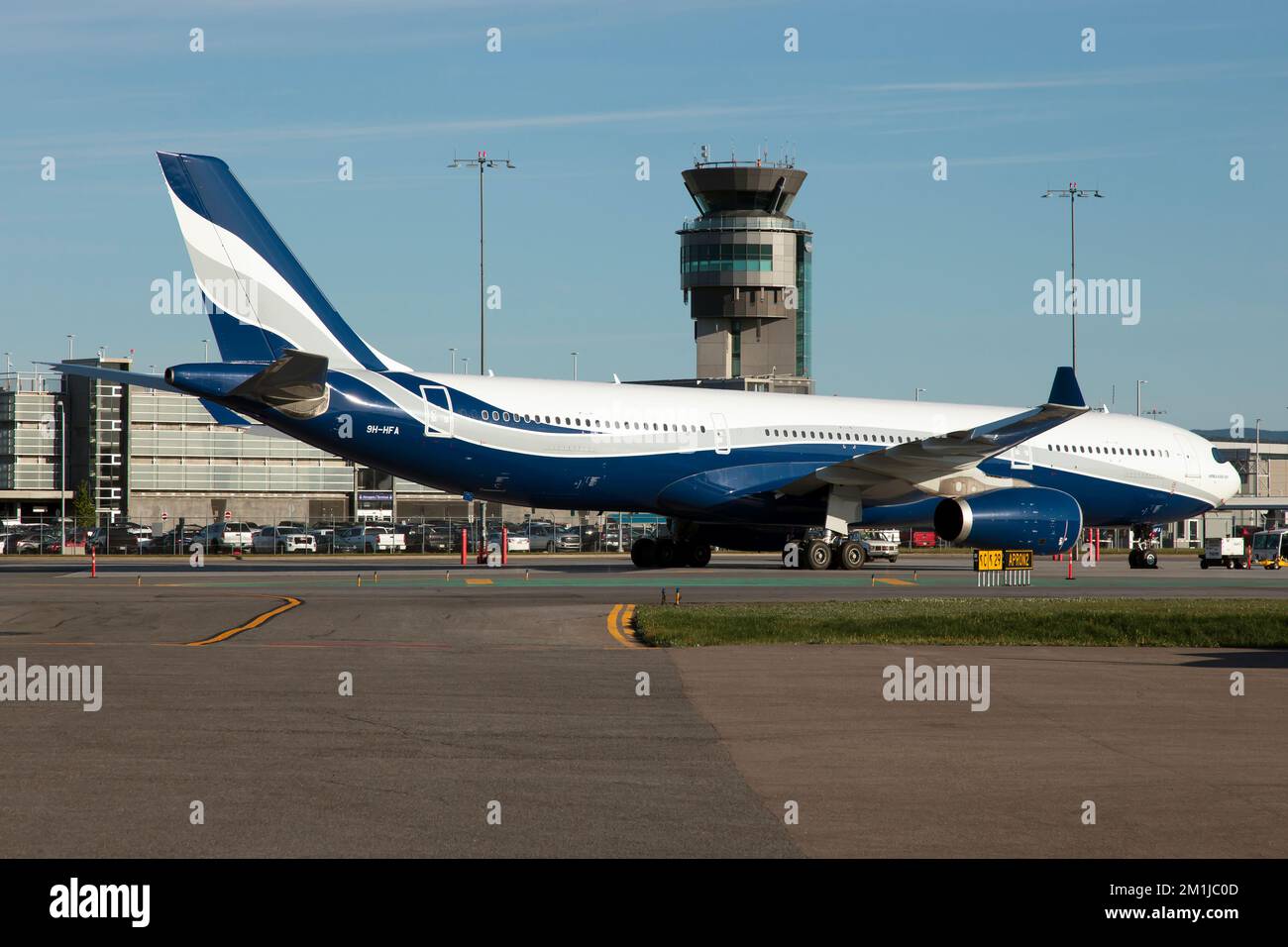 An Hifly Malta Airbus 330-300 parked at Quebec City airport.Hifly Malta is a Maltese charter airline based at Malta International Airport and a subsidiary of the Portuguese charter airline Hi Fly. Stock Photo