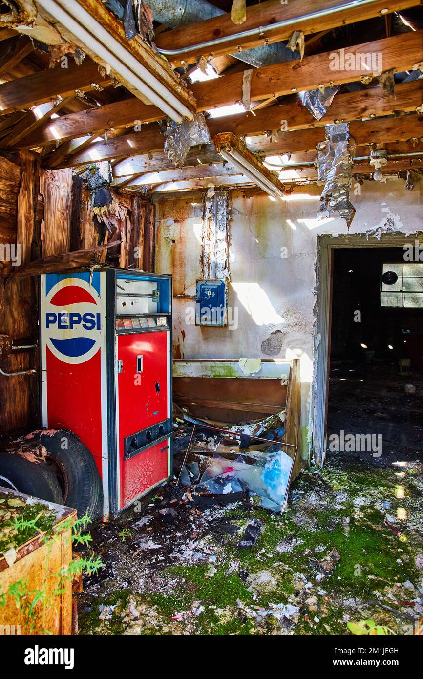 Inside abandoned lobby of mechanic shop with broken Pepsi machine Stock Photo Alamy