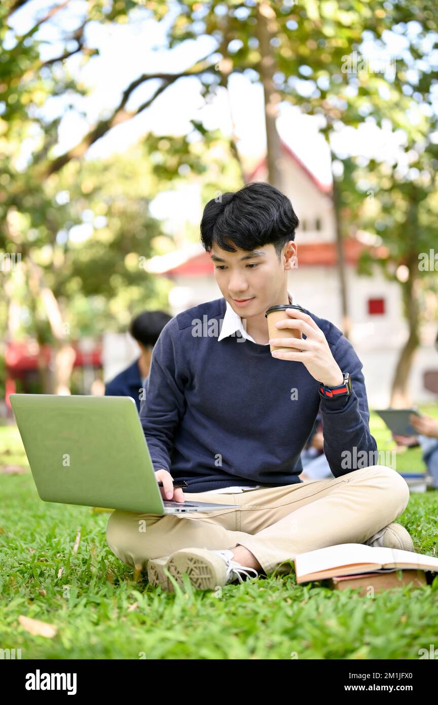 Portrait, Smart and handsome young Asian male college student ...