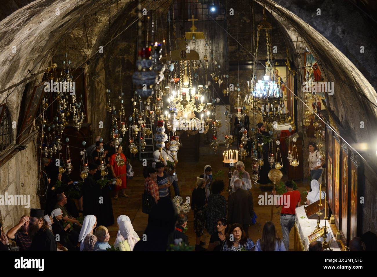 Worshippers gather at the church of the Assumption in East Jerusalem in ...