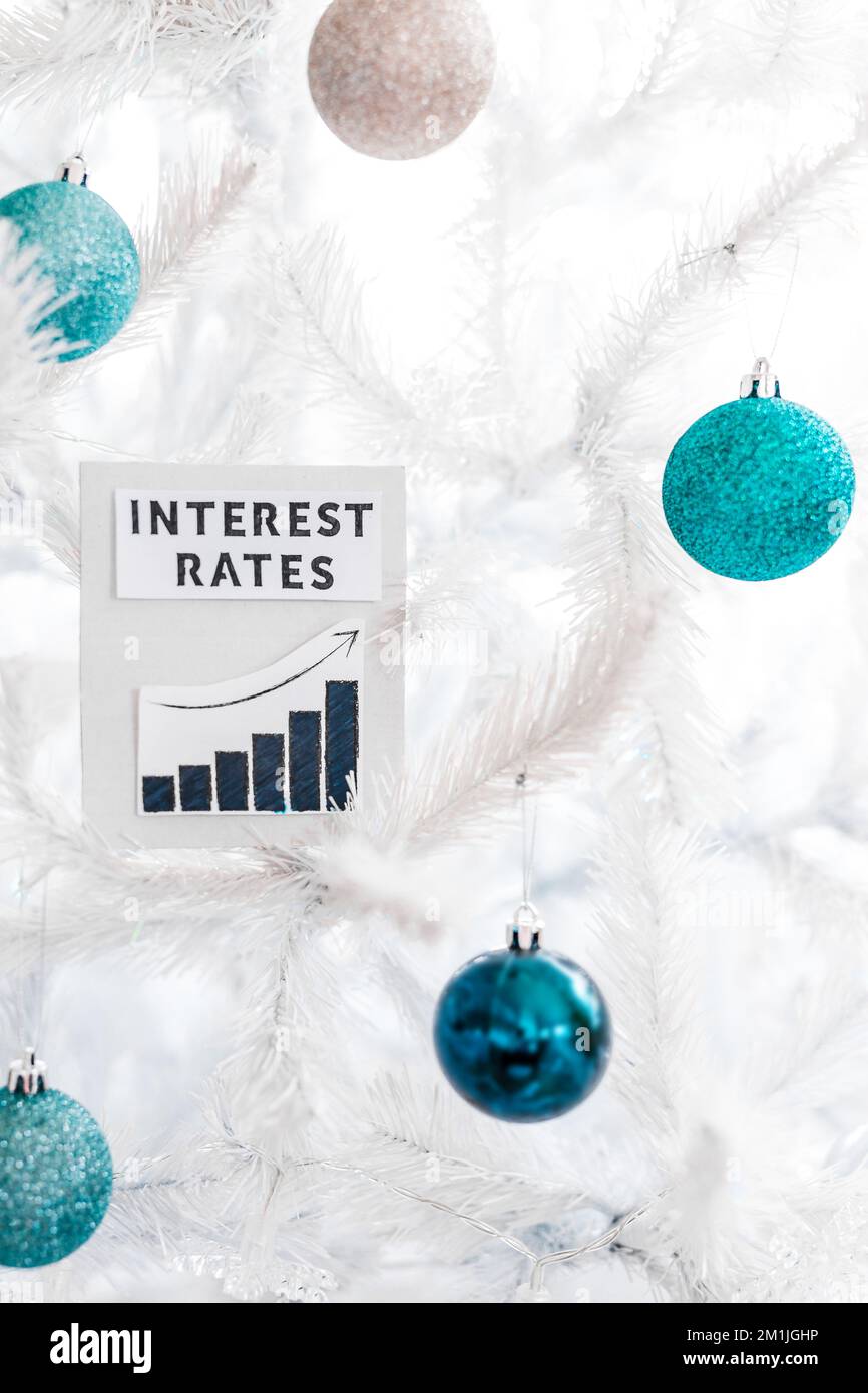 Interest Rates text and graph with growing stats in front of Christmas