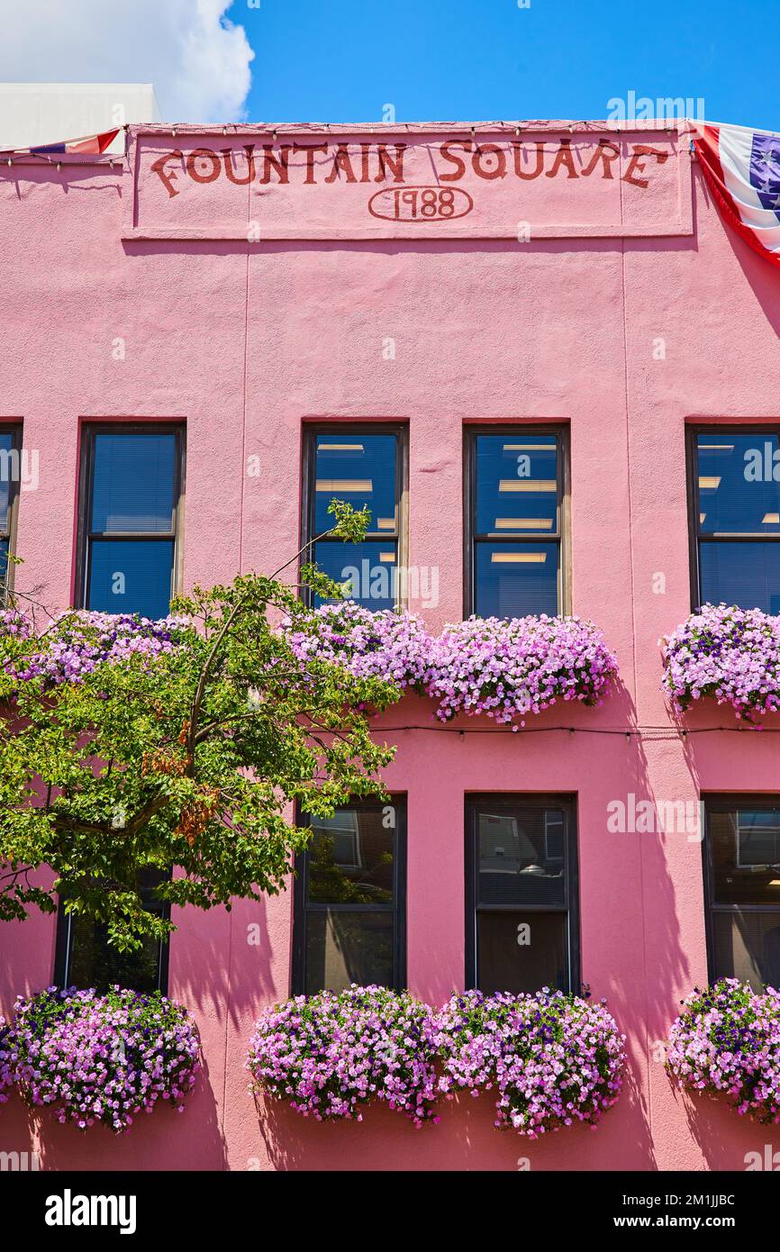 Fountain Square Mall pink exterior covered in pink flowers in