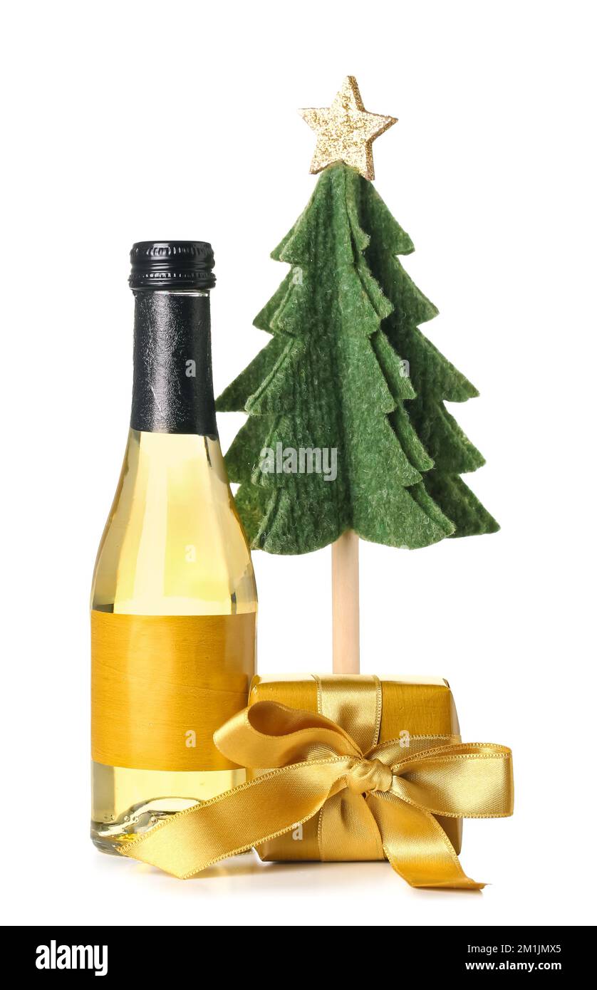 Bottle of wine with gift and Christmas tree on white background Stock