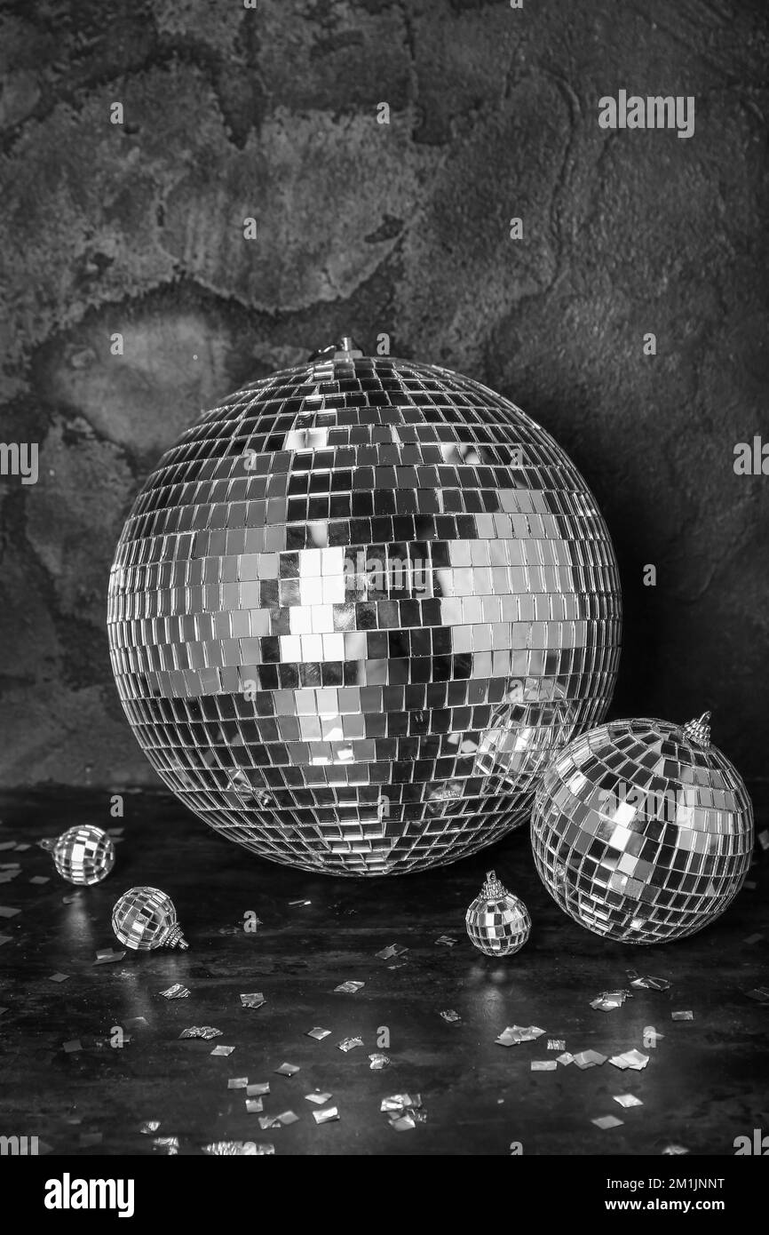 Disco balls with confetti on dark background Stock Photo Alamy