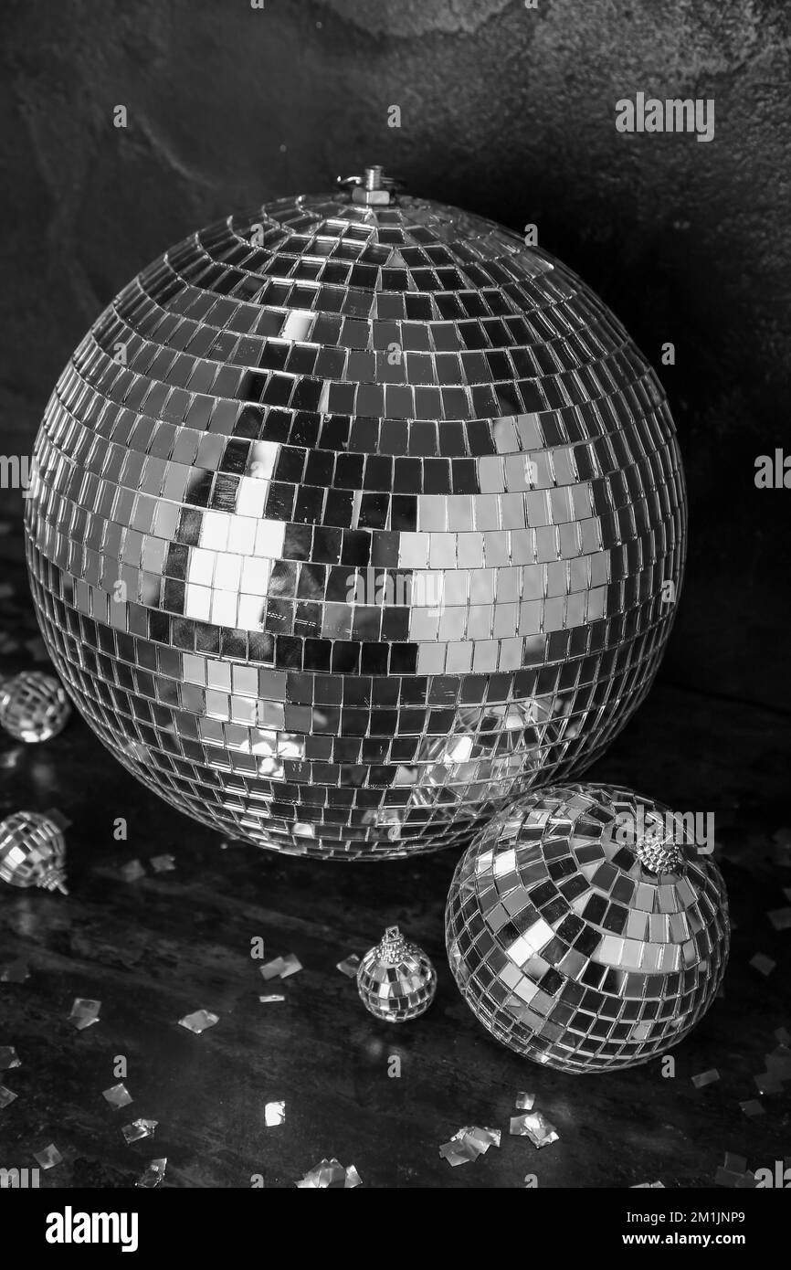 Disco balls with confetti on dark background Stock Photo Alamy