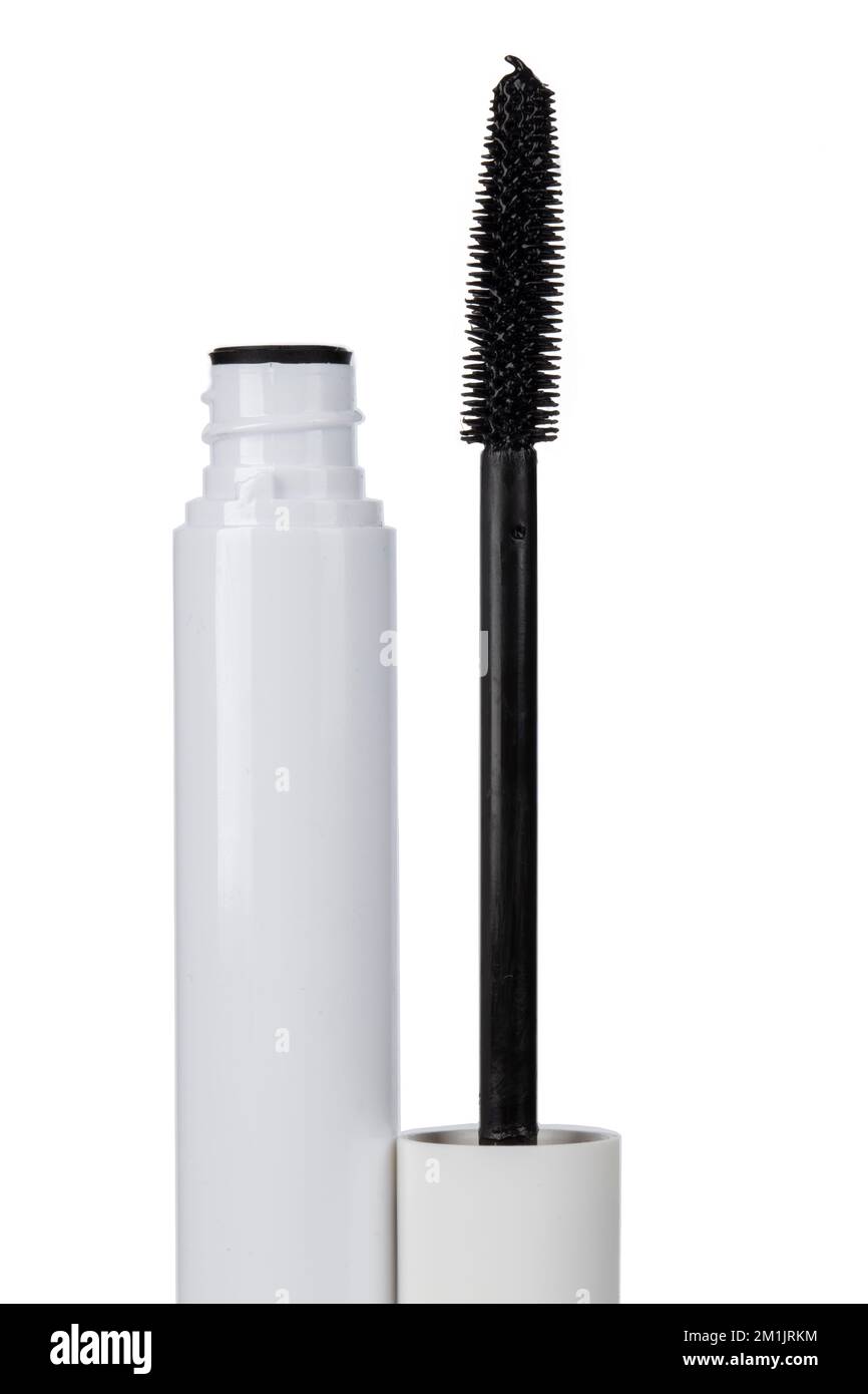 Closeup mascara bottle and brush. Black mascara and tube isolated on
