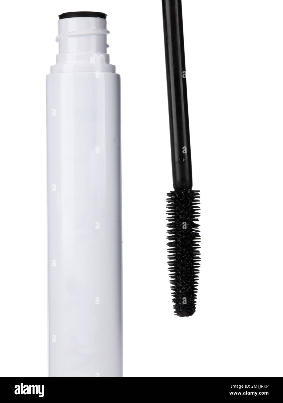 Closeup mascara bottle and brush. Black mascara and tube isolated on