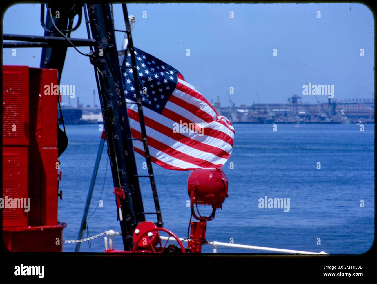 American flag on a boat , Flags. Edmund L. Mitchell Collection Stock