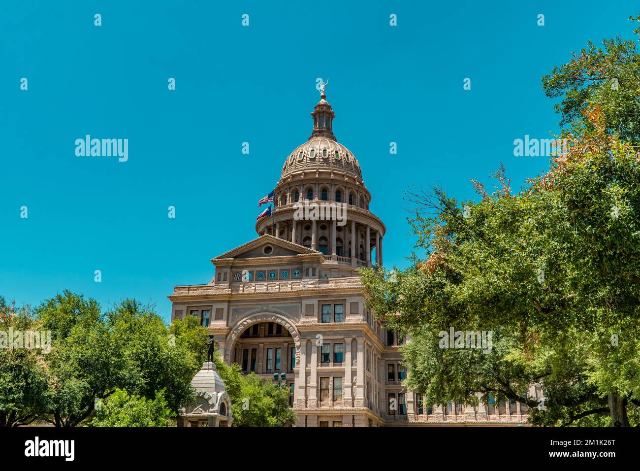 The Texas State Capitol under blue sky on a sunny day in downtown Austin, Texas Stock Photo