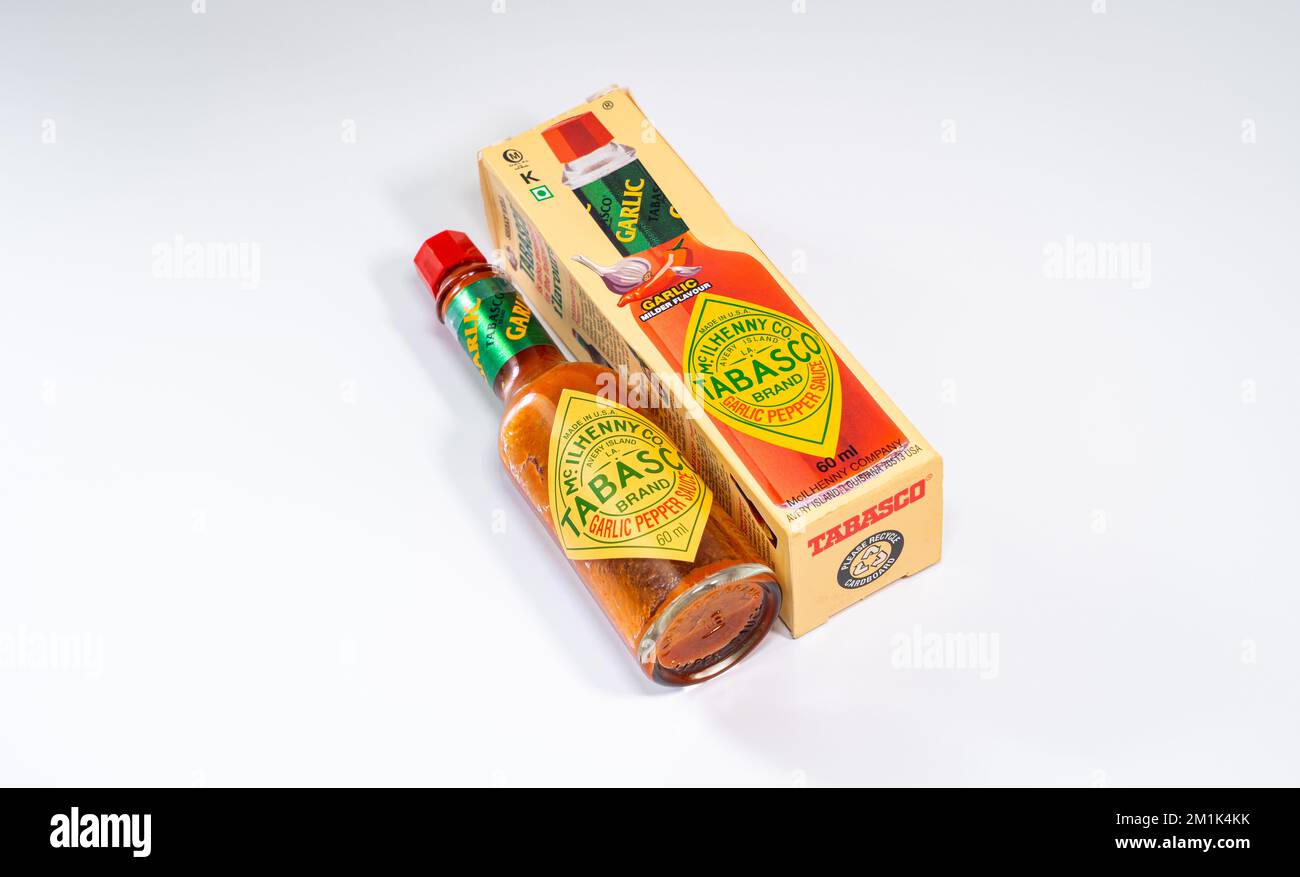 Tabasco Garlic Pepper sauce on white background. Stock Photo