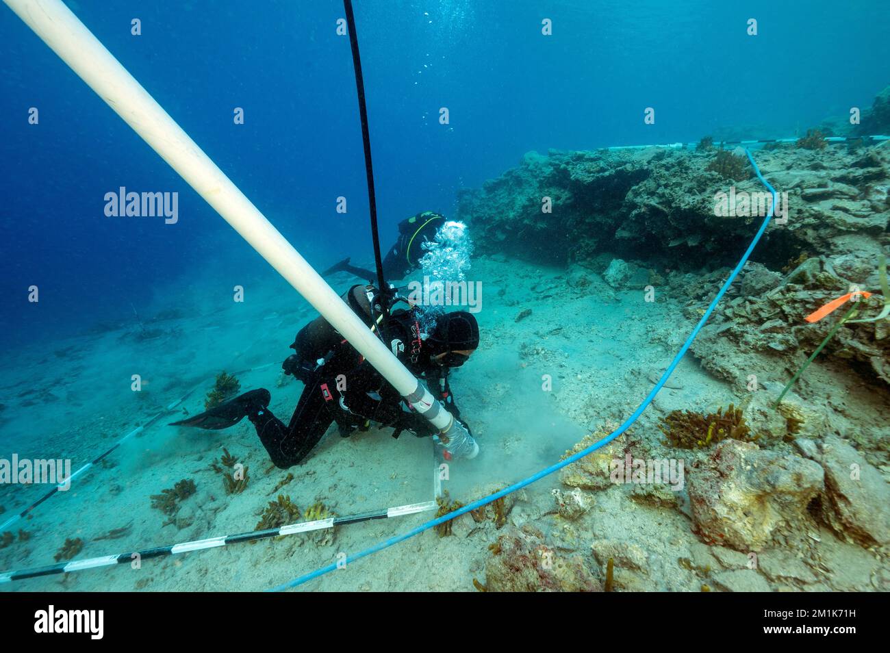 An underwater archaeologist airlifting on the ancient bronze age harbor discovered in Bozburun Marmaris Turkey. Stock Photo