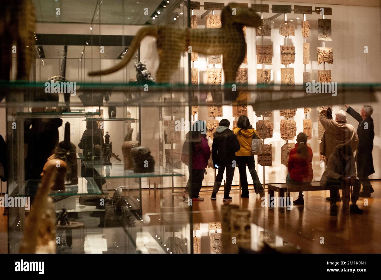 London, UK. 13th Dec, 2022. Visitors to the British Museum in London visit the Benin Bronzes in the Africa gallery (Photo by Jay Shaw Baker/NurPhoto)0 Credit: NurPhoto/Alamy Live News Stock Photo