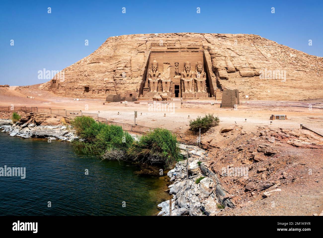 View of Abu Simbel Temple and the shore of Lake Nasser in Egypt Stock Photo