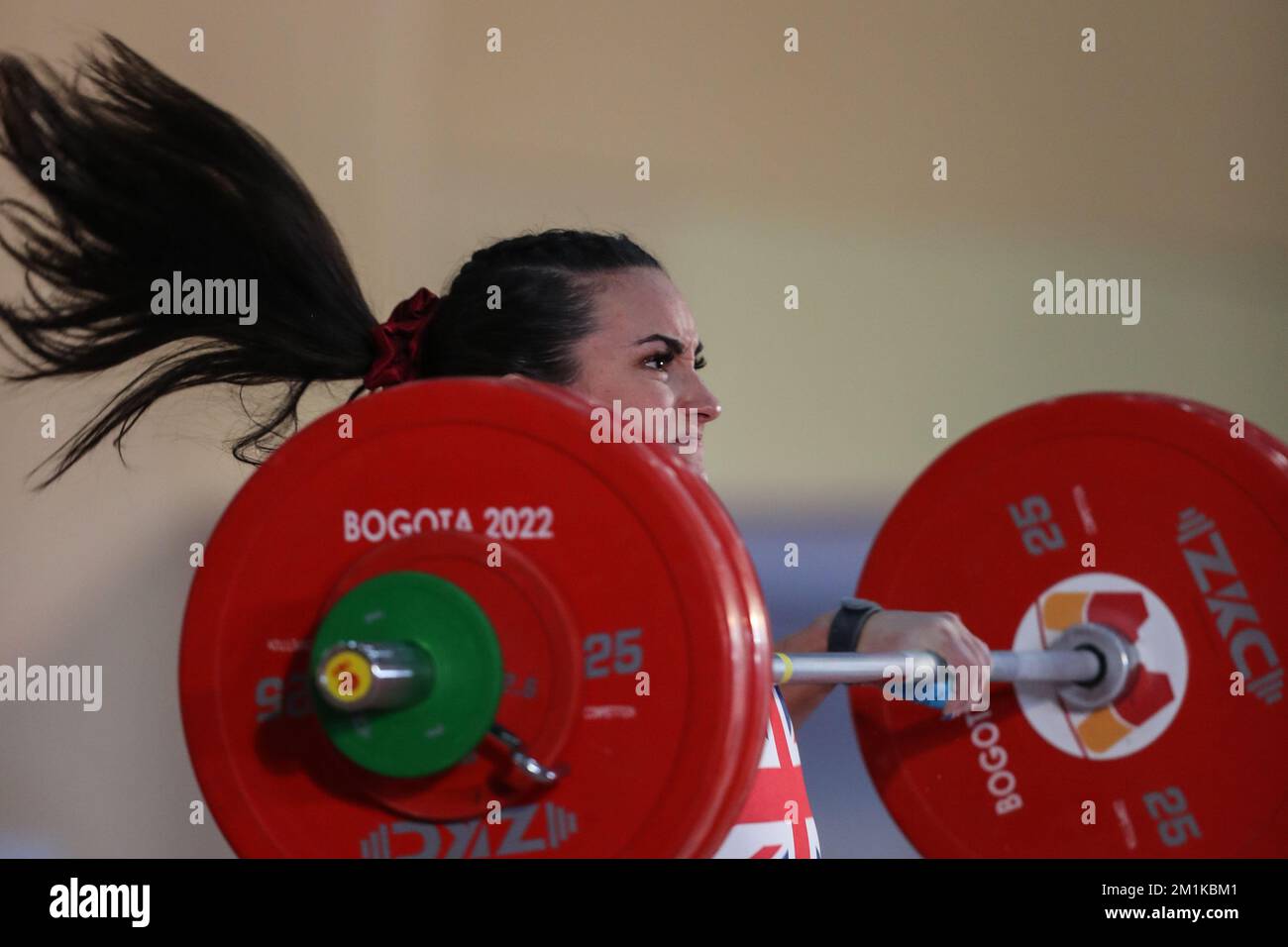 Bogota, Colombia. 12th Dec, 2022. Sarah Davies of Britain competes during the women's 71kg event at the 2022 World Weightlifting Championships held in Bogota, Colombia, Dec. 12, 2022. Credit: Wang Tiancong/Xinhua/Alamy Live News Stock Photo