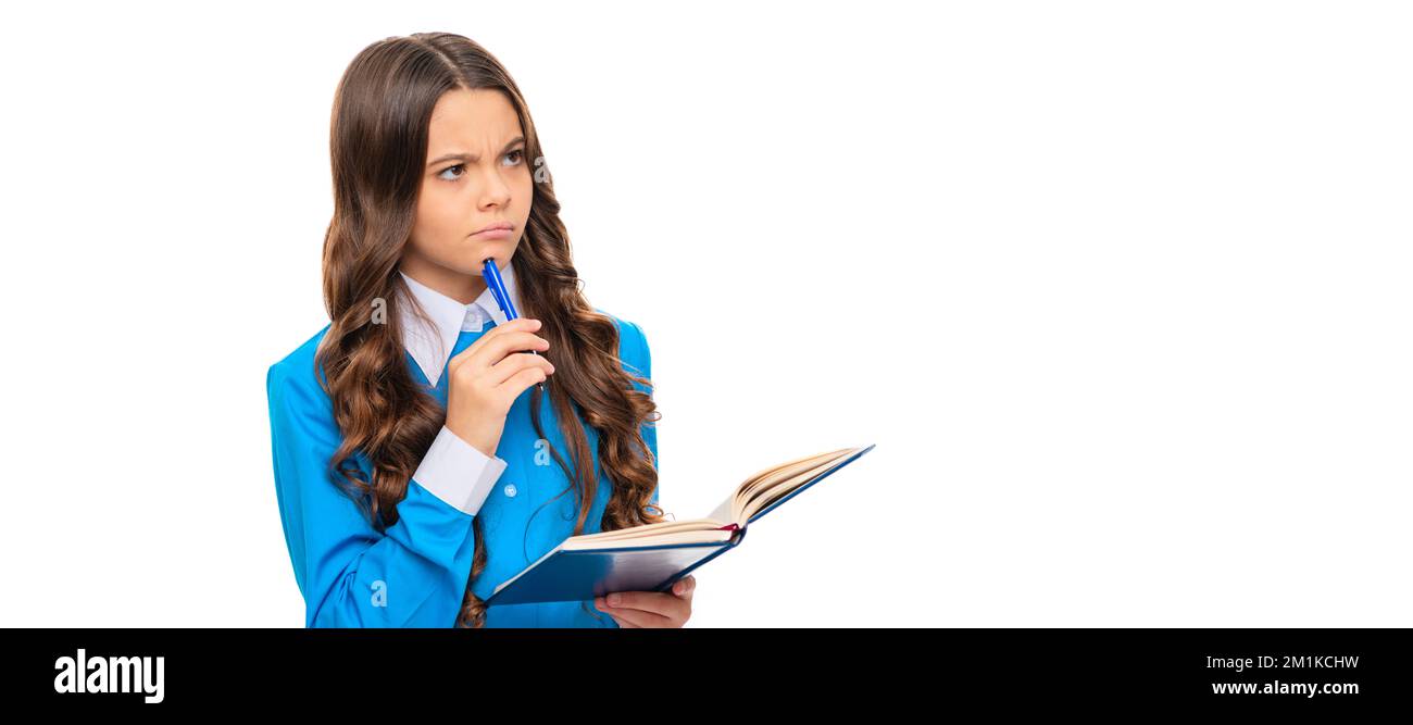 Imaginative child with thoughtful look create idea holding pen and school book, imagination. Banner of school girl student. Schoolgirl pupil portrait Stock Photo