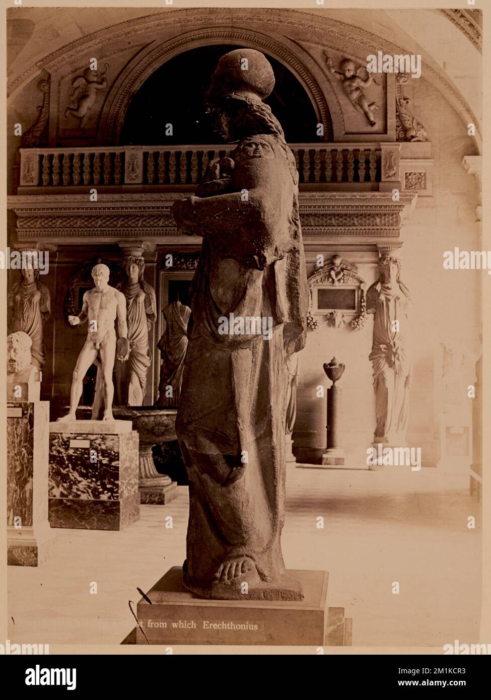 Athena holding a chest from which Erechthonius emerges , Antiquities