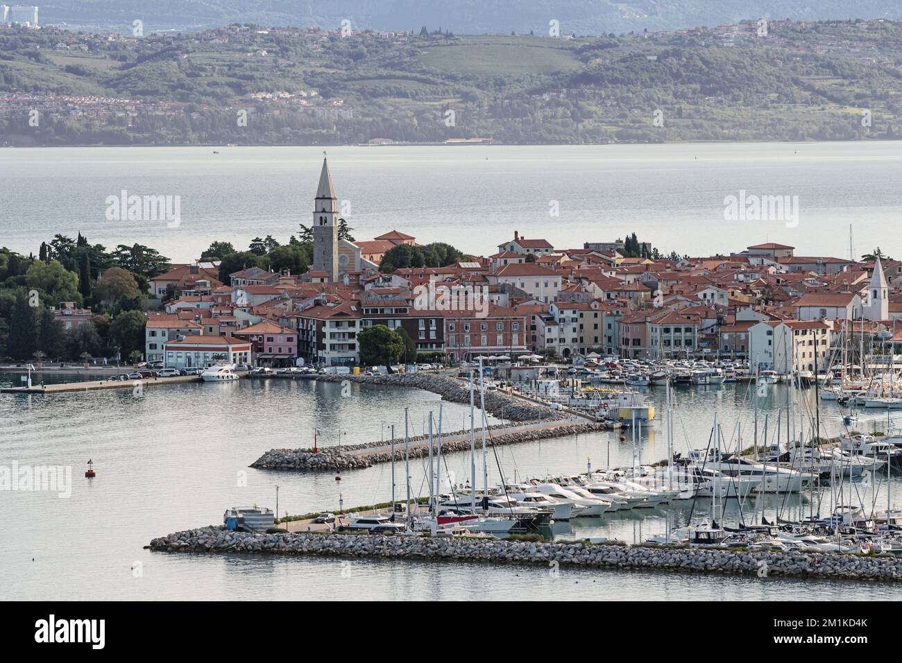 Editorial: IZOLA, SLOVENIA, SEPTEMBER 12, 2022 - Overview of Izola and its marina, seen from the overlook above the small town Stock Photo