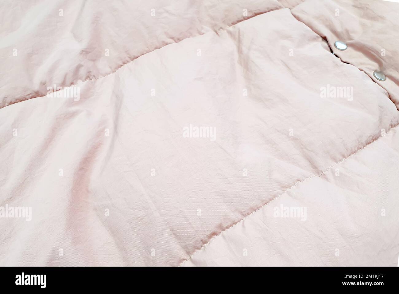 Down jacket fabric background, light pink puffer jacket texture Stock Photo Alamy