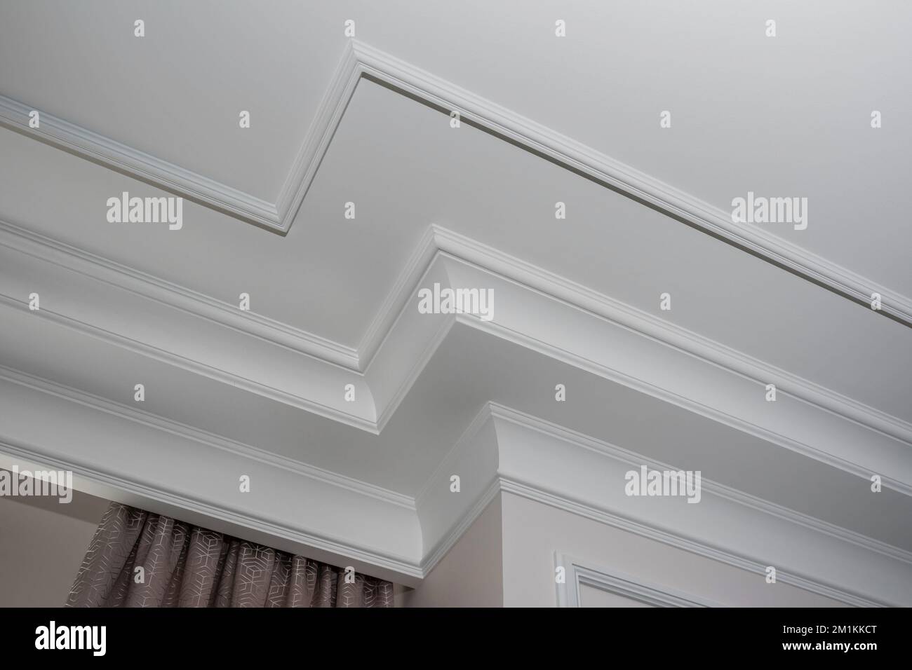 Detail of intricate corner crown molding. a detail of corner ceiling