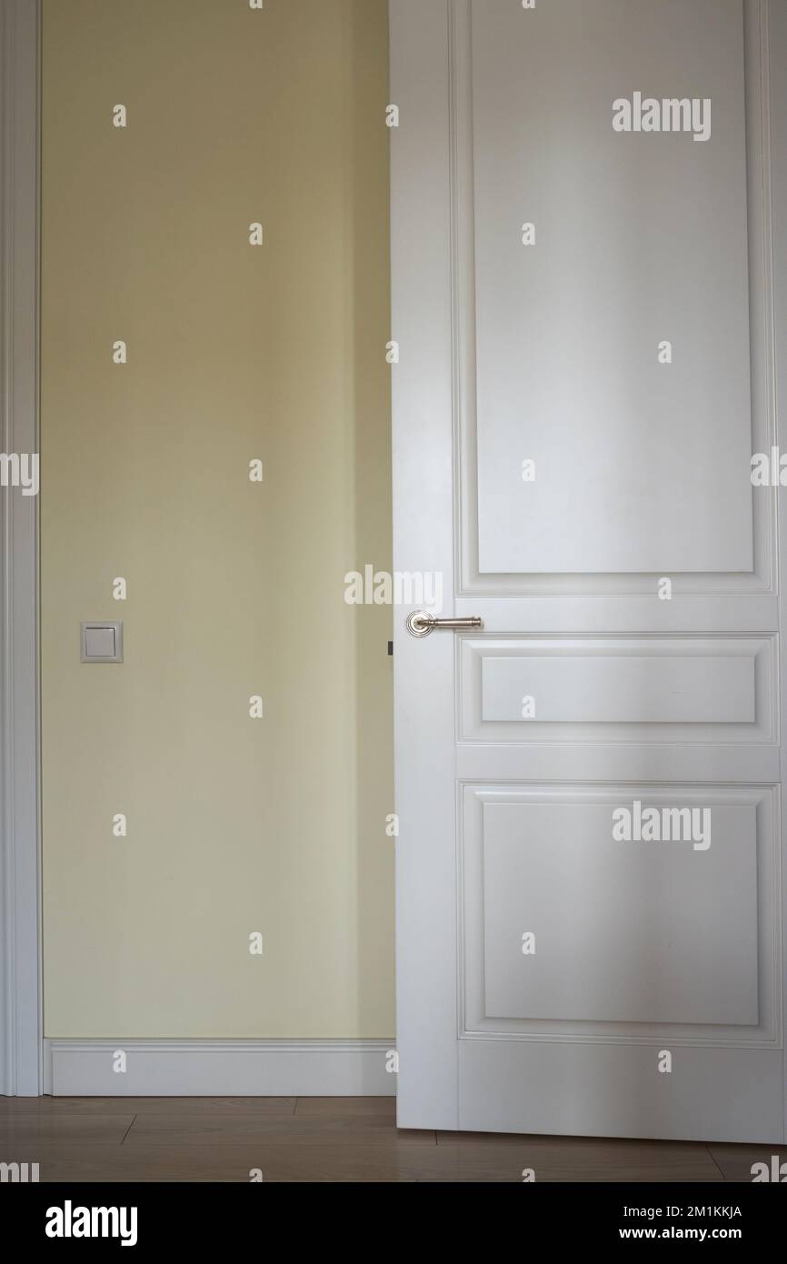 White door in the light beige room Stock Photo Alamy
