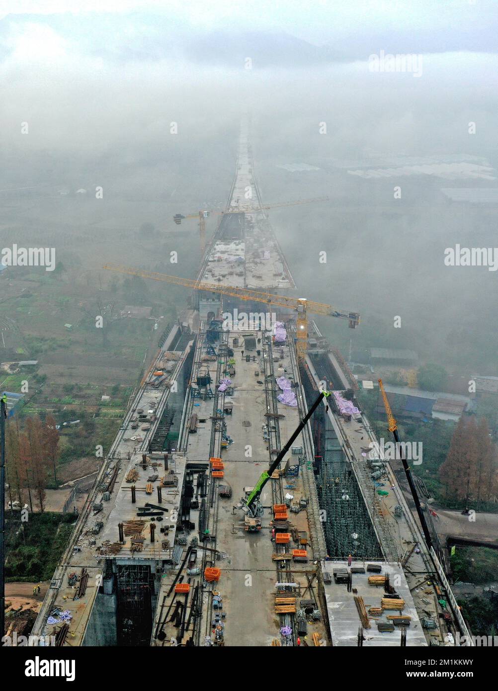 Aerial photo shows constructors working on the site of Xianju Grand