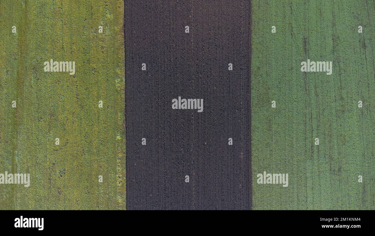 This is a drone photo from a field. I think the drone photos are creating a really new perspective, what we dont see every day. Stock Photo