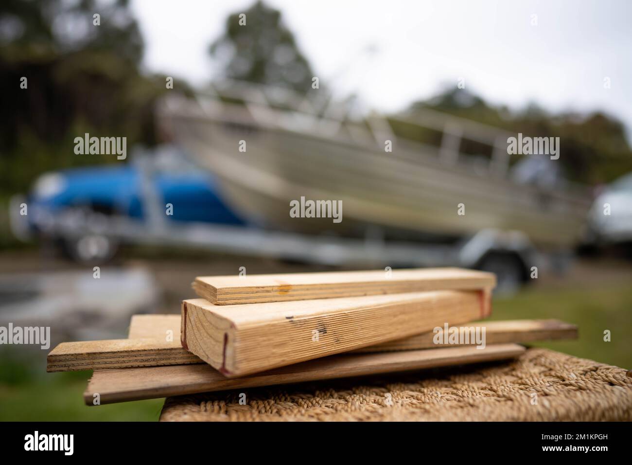 wood chocks for a caravan and camping. chocks behind a tyre. camping