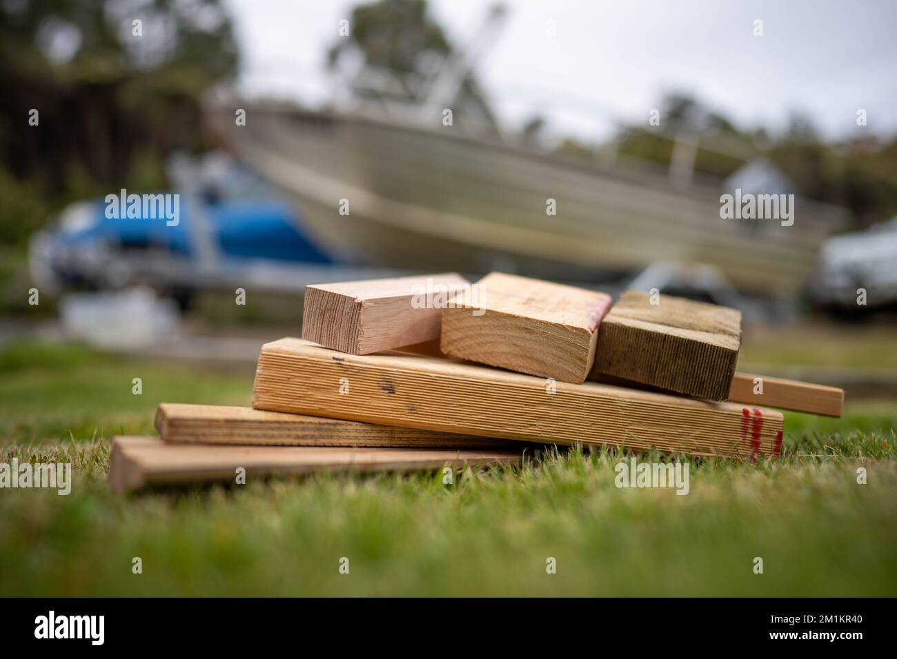 wood chocks for a caravan and camping. chocks behind a tyre. camping chocks for a boat trailer