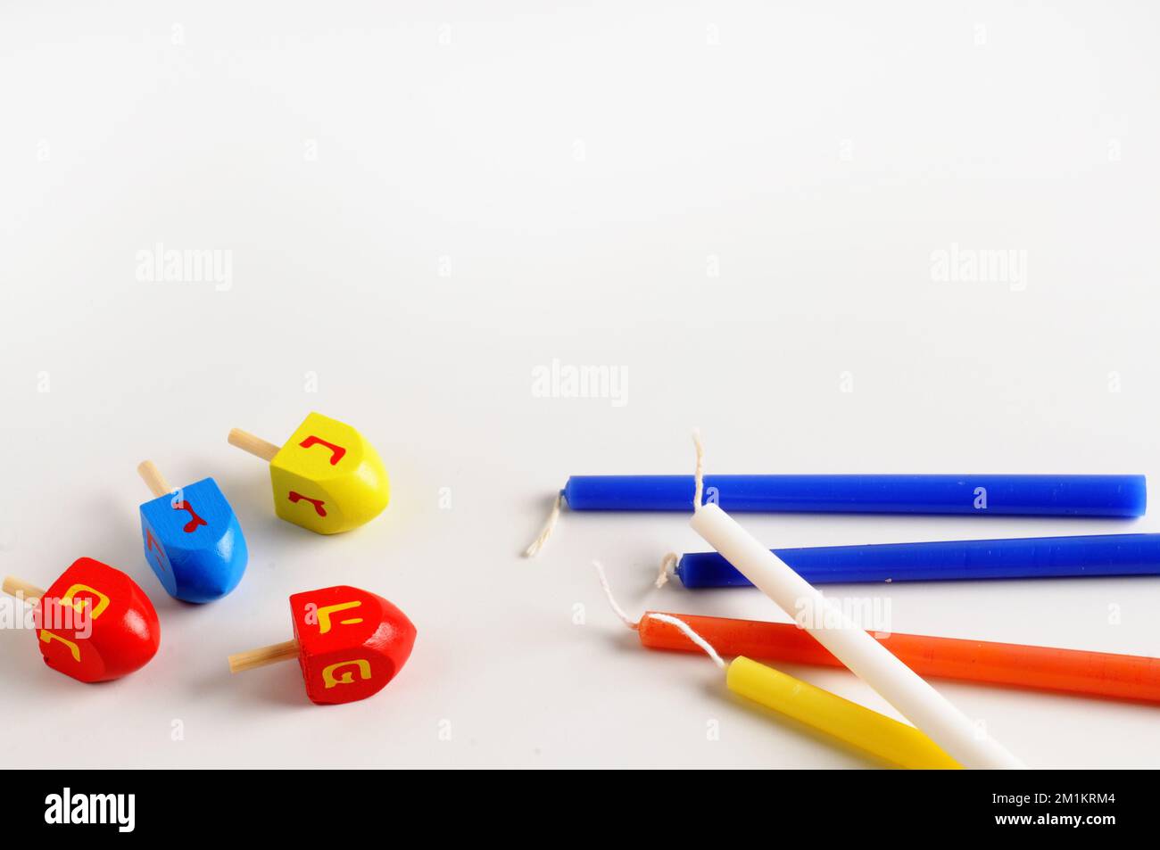 Hanukkah spinning top and candles Traditional Jewish holiday Stock