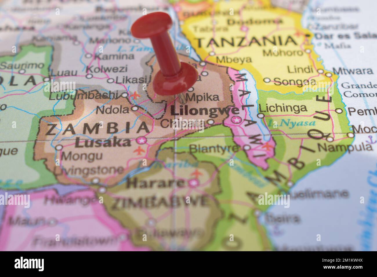 Red Push Pin Pointing on Location of Lilongwe World Map Close-Up View Stock Photograph Stock Photo