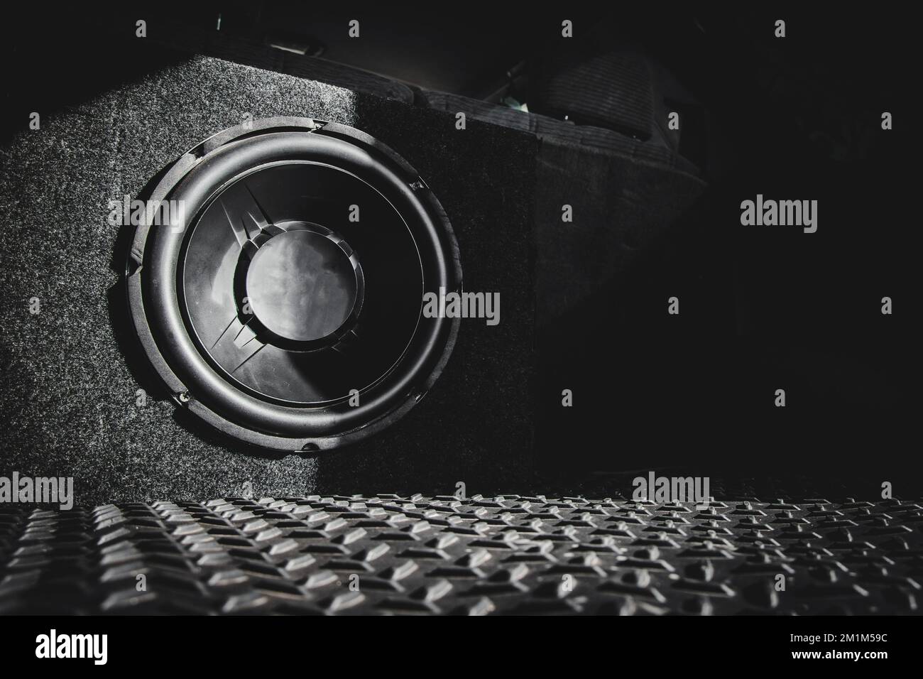 Bass speaker inside a car trunk. Vehicle audio tuning, subwoofer Stock Photo Alamy