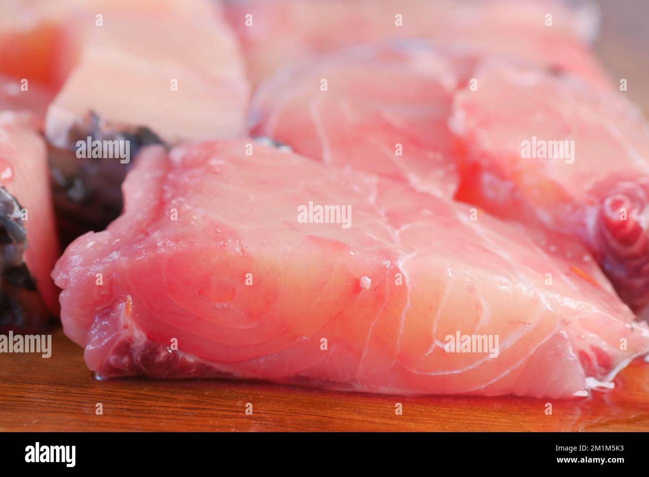 Skinless Cod Fresh boneless skinless cod filet on chopping board Stock Photo - Alamy