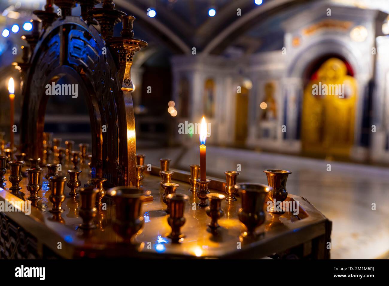 burning candle inside the orthodox church. orthodox ritual Stock Photo Alamy