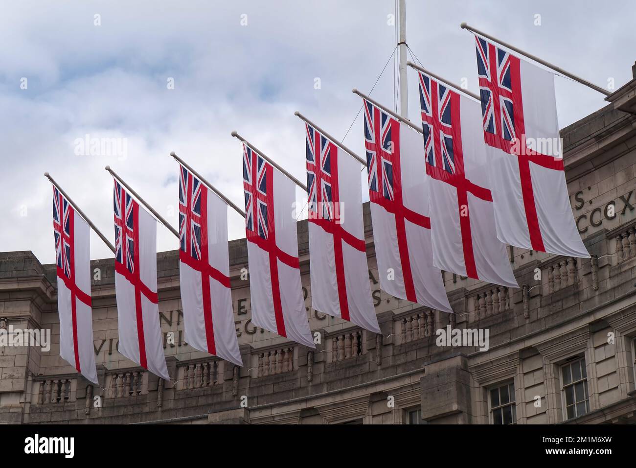 eight Royal Navy White Ensign flags hang on Admiralty Arch, The Mall