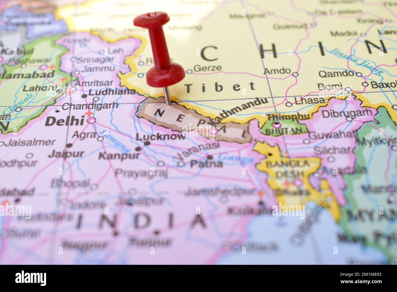 Red Push Pin Pointing On Location Of Nepal World Map Close Up View Red Push Pin Pointing On Location Of Nepal World Map Close Up View Stock Photograph 2M1M892 