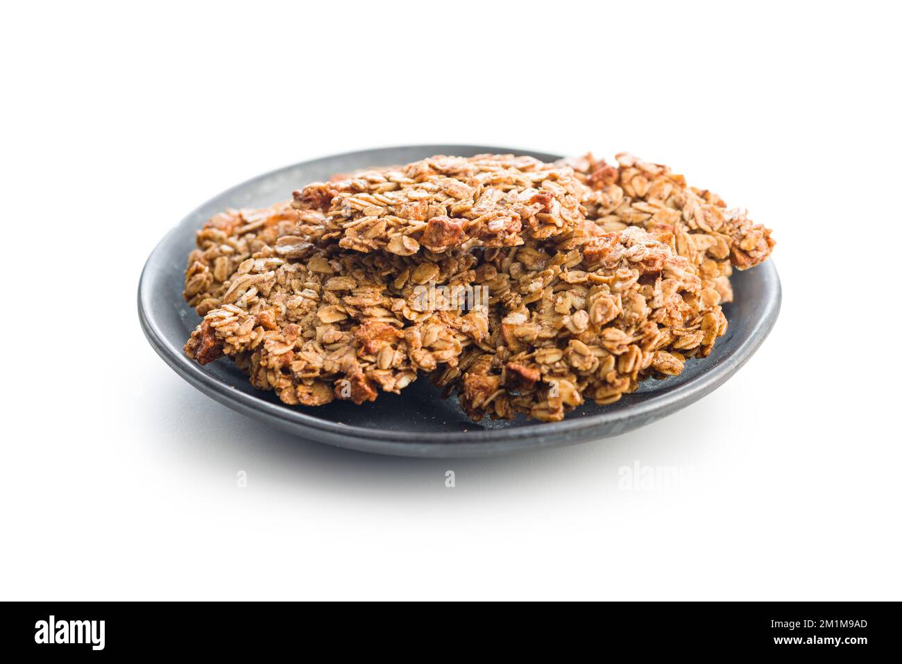 Oatmeal cookies on plate isolated on the white background. Stock Photo