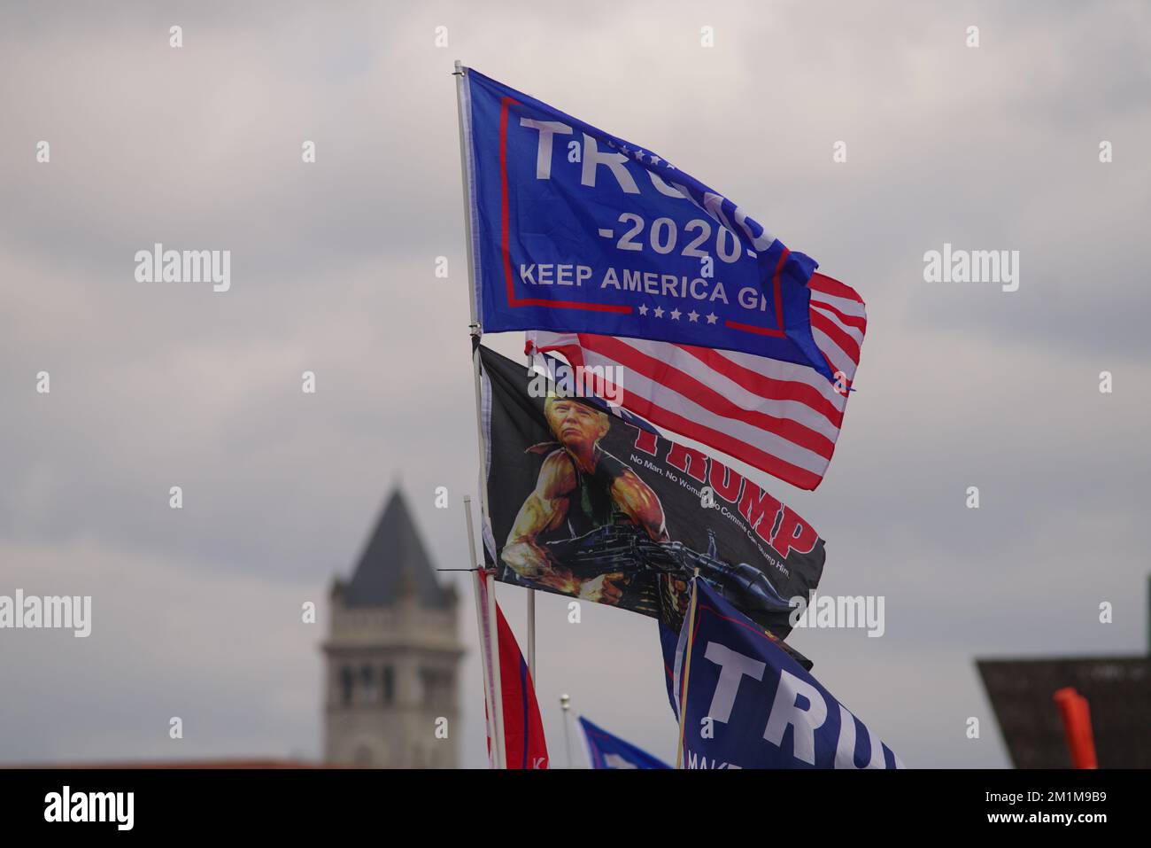 Pro-Trump flags fly at the 'Stop the Steal' rally that preceded the Capitol insurrection on January 6, 2021. Stock Photo