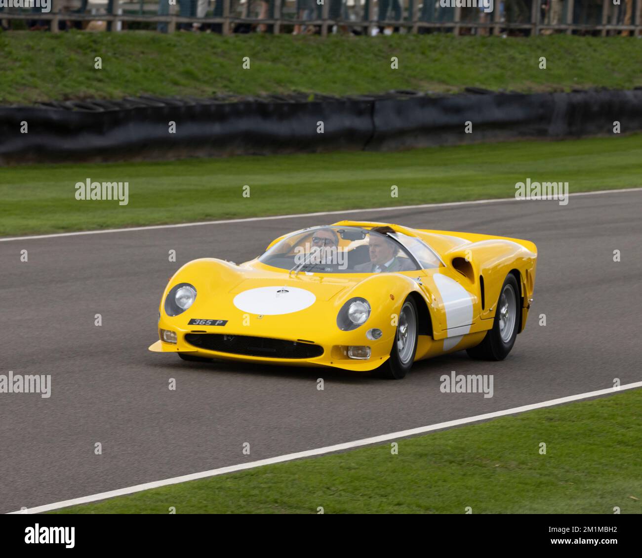 A 1965 Ferrari 365P formerly owned by John Surtees at the 2022 Goodwood ...
