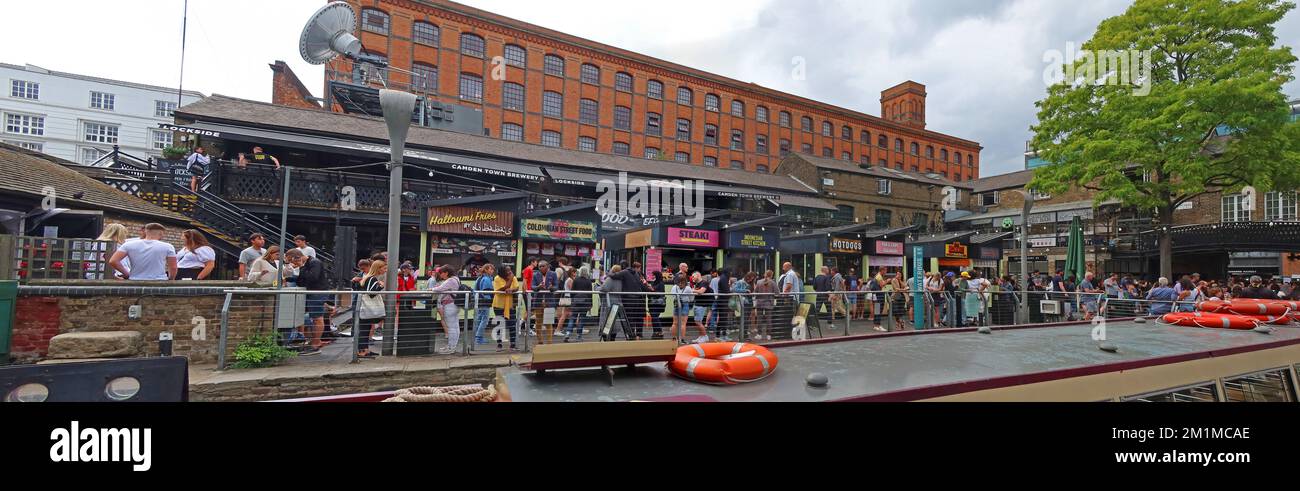 Camden lock panorama, warehouse, barge and busy food stalls, Camden, London, England, UK, NW1 8AF Stock Photo