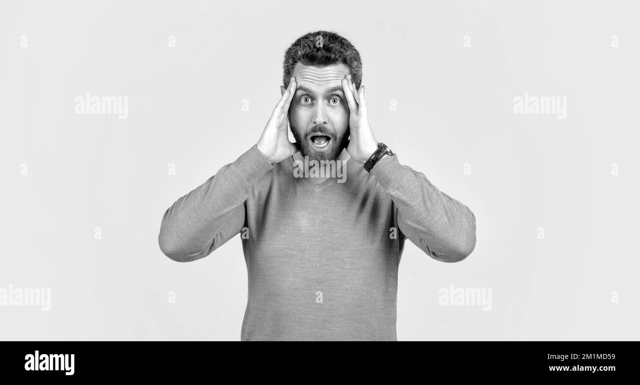 amazed unshaven guy with bristle and moustache. tired and stressed mature guy has headache. Stock Photo