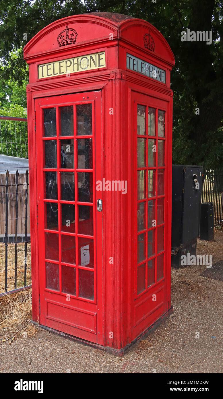 Red British Public Telephone box, K2 Giles Gilbert Scott red telephone box, in Regents Park, North London, England, UK, NW1 4NR Stock Photo
