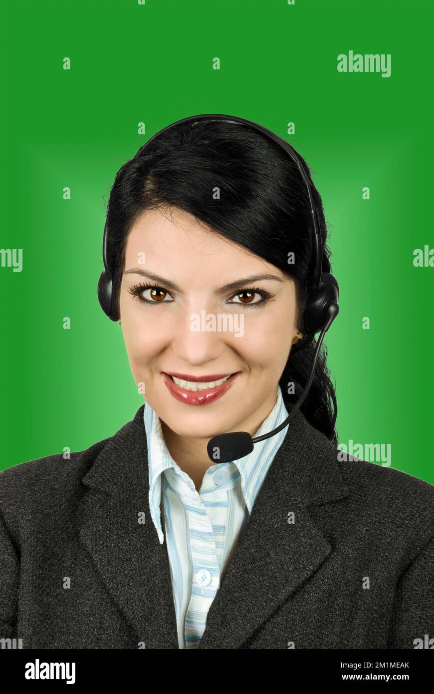 Portrait of beautiful helpdesk or support operator woman answering at your questions Stock Photo