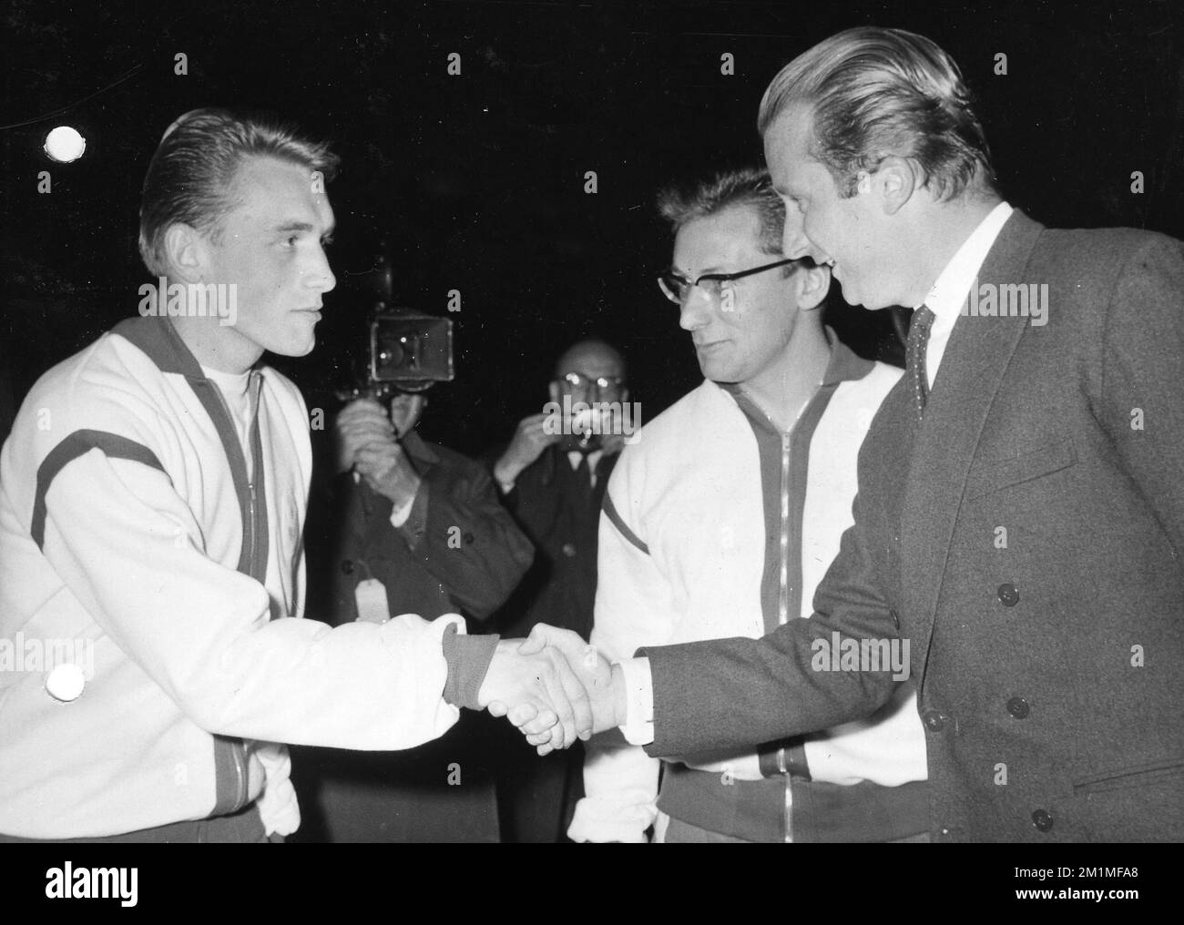 Prince Albert congratulates Paul Van Himst (left) after the Anderlecht v Bologna match in the European Cup. Stock Photo