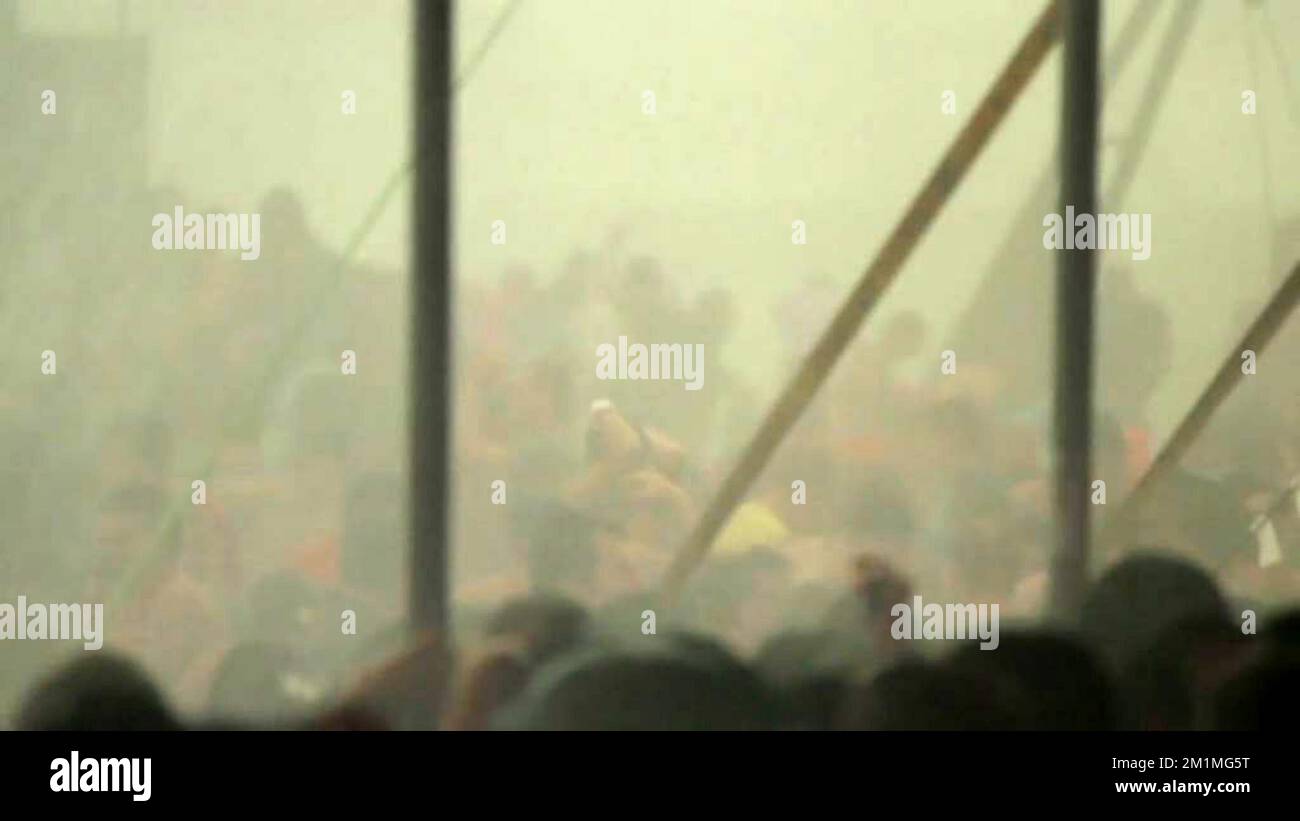 20110819 - KIEWIT, BELGIUM: This video grab released on Friday 19 August 2011 shows the collapsing of the Chateau tent, at the music festival Pukkelpop in Kiewit, Hasselt, yesterday, 18 August 2011. The festival has been cancelled after five people were killed when the 'Chateau' tent collapsed during a short but heavy wind and rain storm. BELGA PHOTO BELGA Stock Photo