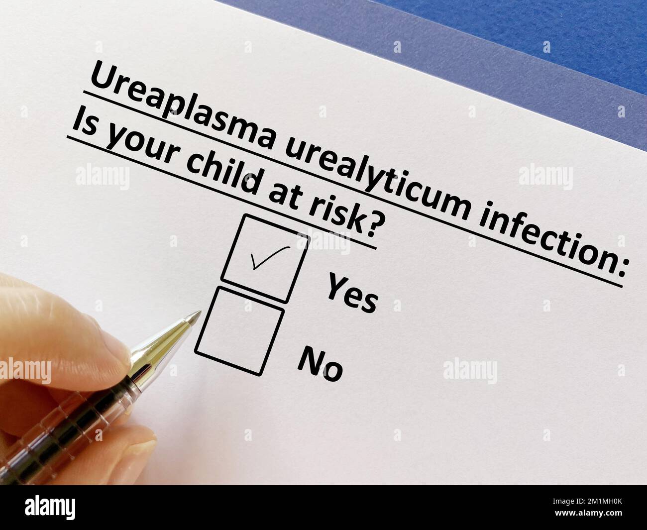 One is answering question about child infection. His child is at risk for ureaplasma urealyticum infection. Stock Photo